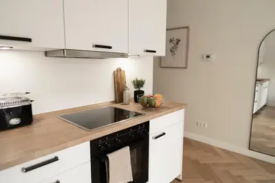 Küche/Küchenzeile in der Unterkunft Design Apartment with Garden
