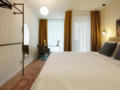 Ein Bett oder Betten in einem Zimmer der Unterkunft ALEXA Chic Design Apart up to 5 persons - Paid Parking - Superfast Wifi