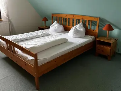 Ein Bett oder Betten in einem Zimmer der Unterkunft Wildpark Johannismühle