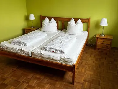 Ein Bett oder Betten in einem Zimmer der Unterkunft Wildpark Johannismühle