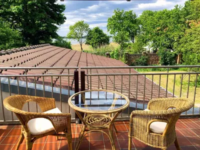 Ein Balkon oder eine Terrasse in der Unterkunft Bruderhof - Retreats & Ferien am See nahe Berlin