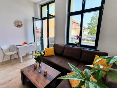 Ein Sitzbereich in der Unterkunft Hogulu - 2 - RAUM - App 13 mit Balkon im Herzen der Altstadt
