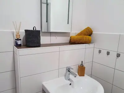 Ein Badezimmer in der Unterkunft Hogulu - 2 - RAUM - App 13 mit Balkon im Herzen der Altstadt