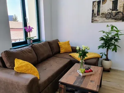 Ein Sitzbereich in der Unterkunft Hogulu - 2 - RAUM - App 13 mit Balkon im Herzen der Altstadt