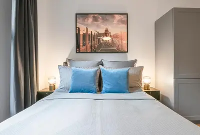 Ein Bett oder Betten in einem Zimmer der Unterkunft The Bornholmer - Group Flats in Central Berlin, Family-Friendly, 4 - 5 Guests