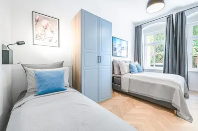 Ein Bett oder Betten in einem Zimmer der Unterkunft The Bornholmer - Group Flats in Central Berlin, Family-Friendly, 4 - 5 Guests