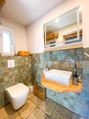 Ein Badezimmer in der Unterkunft Tiny House im grünen Rangsdorf fuer 4 mit Kamin RAN