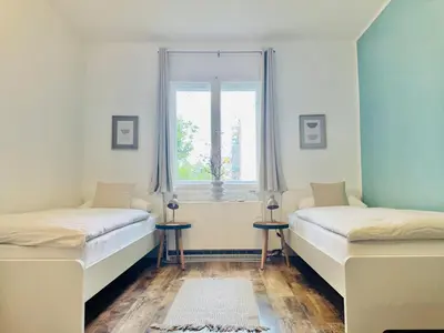 Ein Bett oder Betten in einem Zimmer der Unterkunft Willkommen im Neuköllner Kiez 2 Zimmer