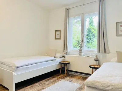 Ein Bett oder Betten in einem Zimmer der Unterkunft Willkommen im Neuköllner Kiez 2 Zimmer