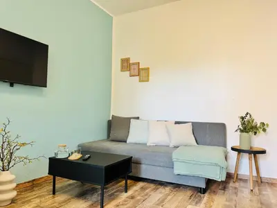 Ein Sitzbereich in der Unterkunft Willkommen im Neuköllner Kiez 2 Zimmer