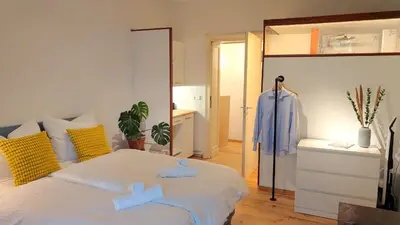 Ein Bett oder Betten in einem Zimmer der Unterkunft studio maiy close to Messe