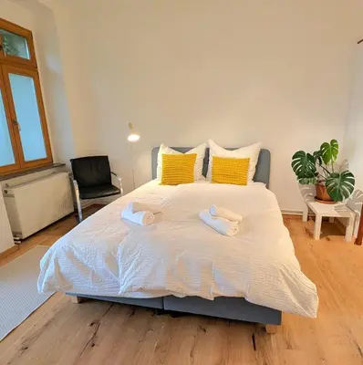 Ein Bett oder Betten in einem Zimmer der Unterkunft studio maiy close to Messe