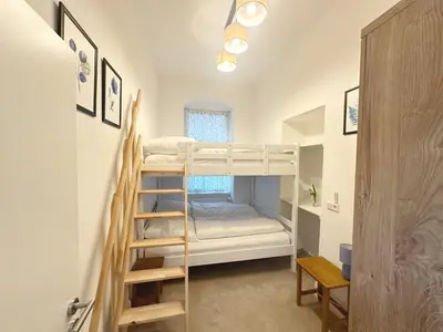 Ein Bett oder Betten in einem Zimmer der Unterkunft ROD 2 Quiet and Familyfriendly Apartment Close to Public Transport