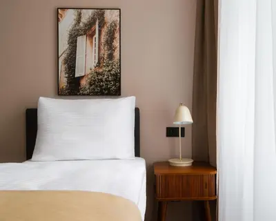 Ein Bett oder Betten in einem Zimmer der Unterkunft Limehome Berlin Weserstraße, Friedrichshain