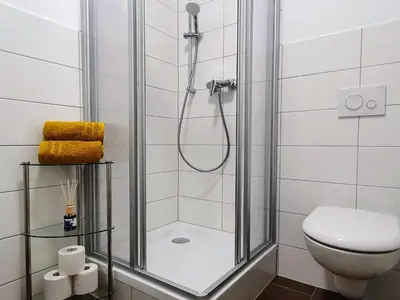 Ein Badezimmer in der Unterkunft Hogulu - 2 - RAUM - App 23 mit Balkon im Herzen der Altstadt