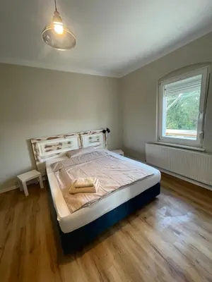 Ein Bett oder Betten in einem Zimmer der Unterkunft Rabbit House