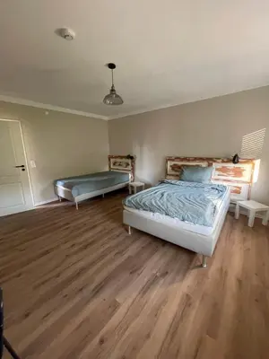 Ein Bett oder Betten in einem Zimmer der Unterkunft Rabbit House
