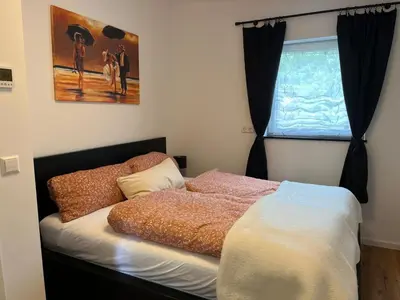 Ein Bett oder Betten in einem Zimmer der Unterkunft Kleines Stübchen im östlichen Speckgürtel von Berlin