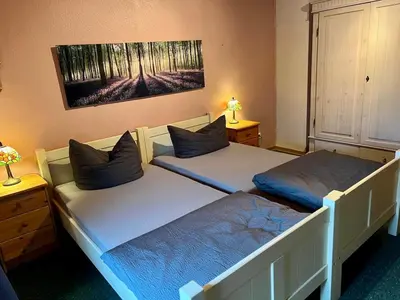 Ein Bett oder Betten in einem Zimmer der Unterkunft Ferienhaus mit eigenem Garten 2 SZ 2 Bäder 70QM