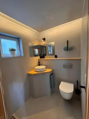 Ein Badezimmer in der Unterkunft Ferienhaus mit eigenem Garten 2 SZ 2 Bäder 70QM