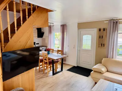 Ein Sitzbereich in der Unterkunft Ferienhaus mit eigenem Garten 2 SZ 2 Bäder 70QM