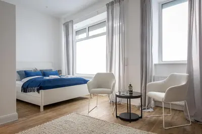 Ein Bett oder Betten in einem Zimmer der Unterkunft Beautiful Apartment in Sprengelkiez