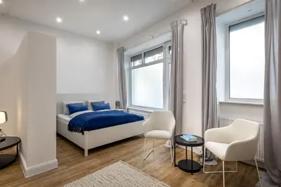 Ein Bett oder Betten in einem Zimmer der Unterkunft Beautiful Apartment in Sprengelkiez
