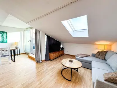 Ein Sitzbereich in der Unterkunft Eiswerder - Inselwohnung in der Havel mit Balkon