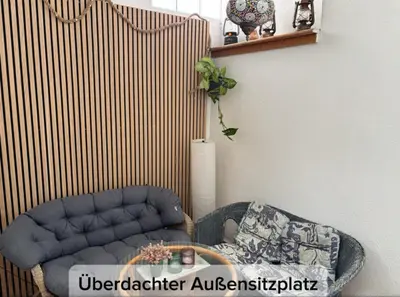 Ein Sitzbereich in der Unterkunft Altstadt & See & Garten Haustiere willkommen