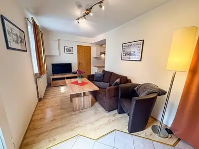 Ein Sitzbereich in der Unterkunft Ferienwohnung Haus Seeblick Geltow