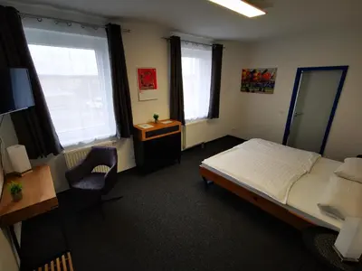 Ein Bett oder Betten in einem Zimmer der Unterkunft Pilotenunterkunft Fliegerhorst