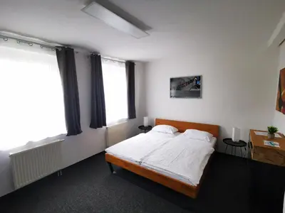 Ein Bett oder Betten in einem Zimmer der Unterkunft Pilotenunterkunft Fliegerhorst