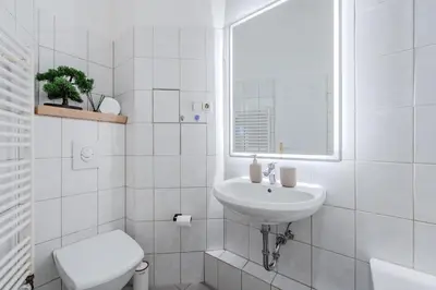 Ein Badezimmer in der Unterkunft Cozy 1BR - Family Retreat in Potsdam!