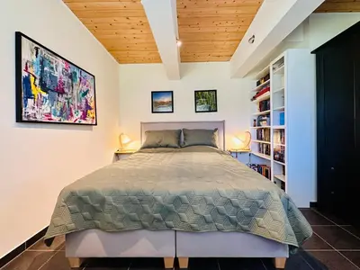 Ein Bett oder Betten in einem Zimmer der Unterkunft Seezeit Storkow & romantisches Baumhaus