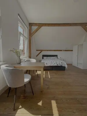 Ein Bett oder Betten in einem Zimmer der Unterkunft Villa Zeppelin 1