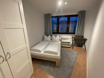 Ein Bett oder Betten in einem Zimmer der Unterkunft Cozy room next to Ku'damm with full kitchen and fast wifi