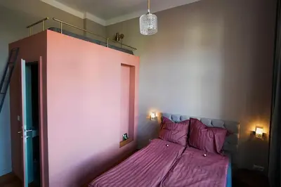 Ein Bett oder Betten in einem Zimmer der Unterkunft Bürgermeisterhaus Jüterbog - Gästeapartments am Kulturquartier