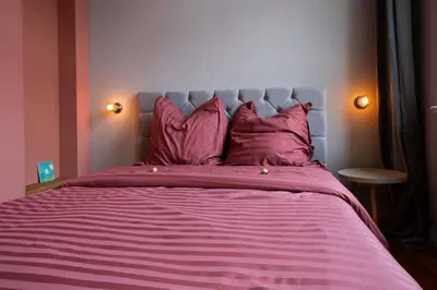 Ein Bett oder Betten in einem Zimmer der Unterkunft Bürgermeisterhaus Jüterbog - Gästeapartments am Kulturquartier