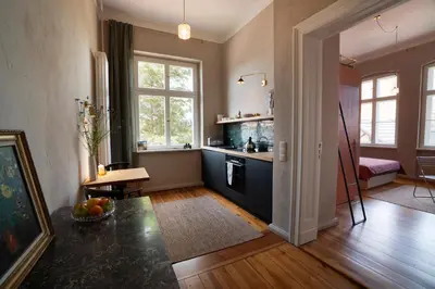 Ein Bett oder Betten in einem Zimmer der Unterkunft Bürgermeisterhaus Jüterbog - Gästeapartments am Kulturquartier