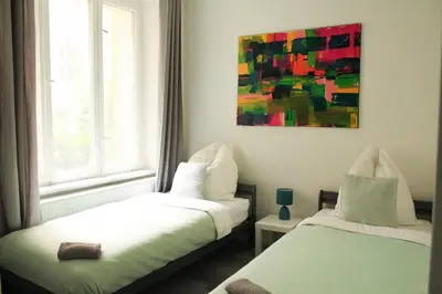 Ein Bett oder Betten in einem Zimmer der Unterkunft Moderne Unterkunft Neukölln