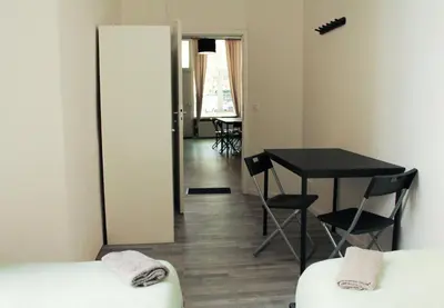 Ein Bett oder Betten in einem Zimmer der Unterkunft Moderne Unterkunft Neukölln