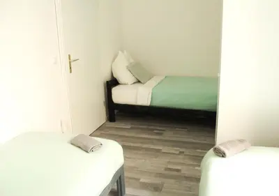 Ein Bett oder Betten in einem Zimmer der Unterkunft Moderne Unterkunft Neukölln