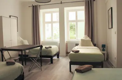 Ein Bett oder Betten in einem Zimmer der Unterkunft Moderne Unterkunft Neukölln