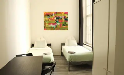 Ein Bett oder Betten in einem Zimmer der Unterkunft Moderne Unterkunft Neukölln