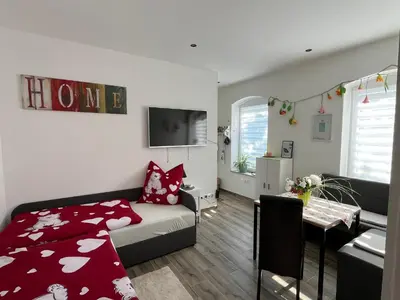 Ein Bett oder Betten in einem Zimmer der Unterkunft Ferienwohnung im Grünen
