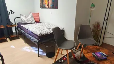 Ein Bett oder Betten in einem Zimmer der Unterkunft Gemütliche Ferienwohnung Berlin für 9 Personen