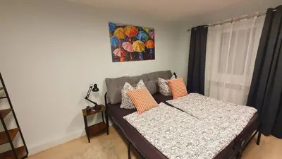 Ein Bett oder Betten in einem Zimmer der Unterkunft Gemütliche Ferienwohnung Berlin für 9 Personen