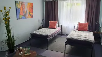 Ein Bett oder Betten in einem Zimmer der Unterkunft Gemütliche Ferienwohnung Berlin für 9 Personen