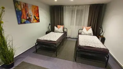 Ein Bett oder Betten in einem Zimmer der Unterkunft Gemütliche Ferienwohnung Berlin für 9 Personen