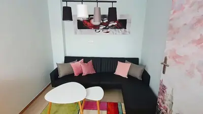 Ein Sitzbereich in der Unterkunft Gemütliche Ferienwohnung Berlin für 9 Personen